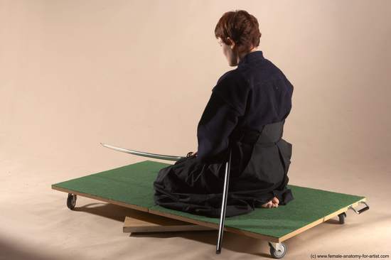 Sportswear Fighting with sword Woman White Sitting poses - ALL Slim short red Sitting poses - on knees Academic