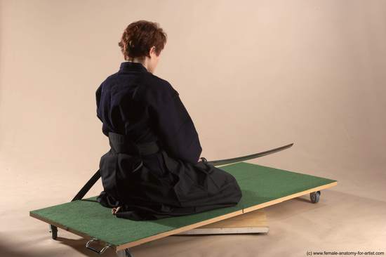 Sportswear Fighting with sword Woman White Sitting poses - ALL Slim short red Sitting poses - on knees Academic