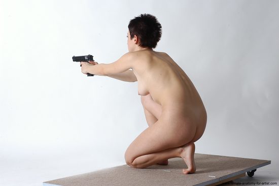 Nude Fighting with gun Woman White Kneeling poses - ALL Slim Kneeling poses - on both knees short black Pinup