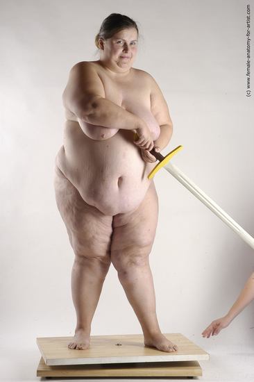 Nude Fighting with sword Woman White Standing poses - ALL Overweight medium brown Standing poses - simple Pinup