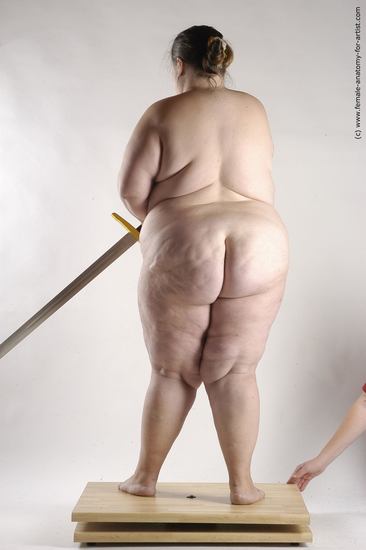 Nude Fighting with sword Woman White Standing poses - ALL Overweight medium brown Standing poses - simple Pinup