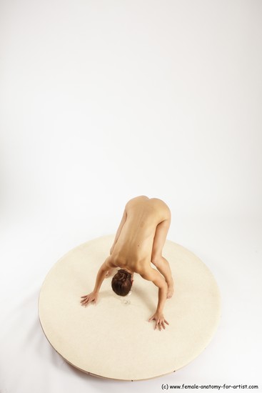 Nude Gymnastic poses Woman White Standing poses - ALL Athletic Standing poses - bend over medium brown Multi angle poses Pinup