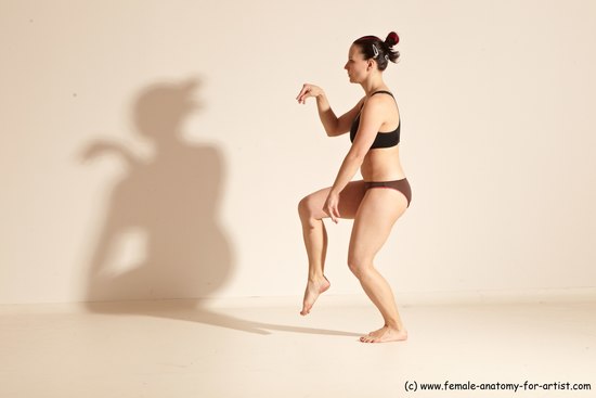 Underwear Martial art Woman White Moving poses Average long colored Dynamic poses Academic