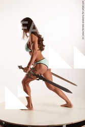 Swimsuit Fighting with sword Woman White Standing poses - ALL Muscular long brown Standing poses - simple Standard Photoshoot Academic