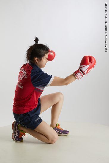 Sportswear Woman Asian Kneeling poses - ALL Average Kneeling poses - on one knee medium black Standard Photoshoot Academic