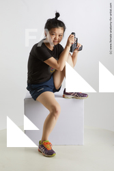 Sportswear Fighting with gun Woman Asian Sitting poses - ALL Average medium black Sitting poses - simple Standard Photoshoot Academic