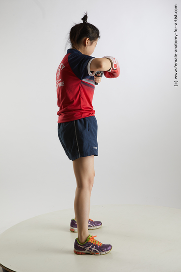 Sportswear Fighting with gun Woman Asian Standing poses - ALL Average medium black Standing poses - simple Standard Photoshoot Academic