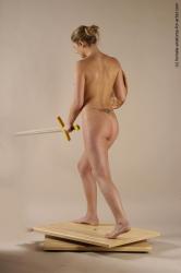 Nude Fighting with sword Woman White Standing poses - ALL Slim long brown Standing poses - simple Pinup