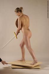 Nude Fighting with sword Woman White Standing poses - ALL Slim long brown Standing poses - simple Pinup