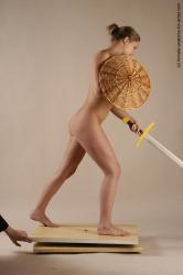 Nude Fighting with sword Woman White Standing poses - ALL Slim long brown Standing poses - simple Pinup