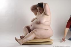 Nude Woman White Sitting poses - ALL Overweight medium brown Sitting poses - simple Pinup