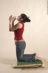 Casual Woman Multiracial Kneeling poses - ALL Slim Kneeling poses - on both knees long black Academic