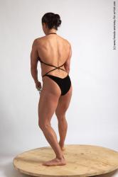 Swimsuit Holding Woman White Standing poses - ALL Muscular long brown Standing poses - simple Academic