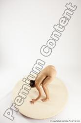 Nude Gymnastic poses Woman White Standing poses - ALL Athletic Standing poses - bend over medium brown Multi angle poses Pinup