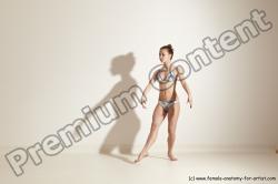 Swimsuit Woman White Slim long brown Dancing Dynamic poses Academic