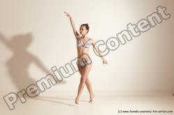 Swimsuit Woman White Slim long brown Dancing Dynamic poses Academic