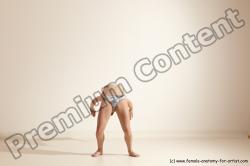 Swimsuit Gymnastic poses Woman White Moving poses Slim long brown Dynamic poses Academic