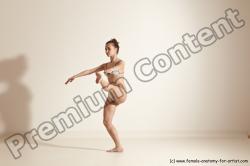 Swimsuit Gymnastic poses Woman White Moving poses Slim long brown Dynamic poses Academic