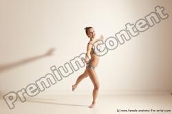 Swimsuit Gymnastic poses Woman White Moving poses Slim long brown Dynamic poses Academic