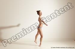 Swimsuit Gymnastic poses Woman White Moving poses Slim long brown Dynamic poses Academic