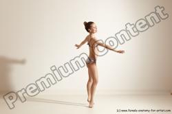 Swimsuit Gymnastic poses Woman White Moving poses Slim long brown Dynamic poses Academic