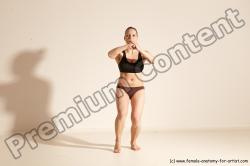 Underwear Martial art Woman White Moving poses Average long colored Dynamic poses Academic