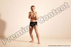 Underwear Martial art White Moving poses Slim short blond Dynamic poses