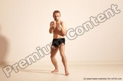 Underwear Martial art White Moving poses Slim short blond Dynamic poses