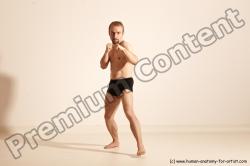 Underwear Martial art White Moving poses Slim short blond Dynamic poses