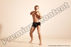 Underwear Martial art White Moving poses Slim short blond Dynamic poses