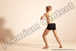 Underwear Martial art White Moving poses Slim short blond Dynamic poses