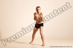 Underwear Martial art White Moving poses Slim short blond Dynamic poses