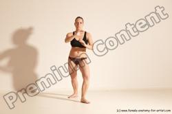 Underwear Martial art Woman White Moving poses Average long colored Dynamic poses Academic