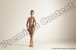 Swimsuit Gymnastic poses Woman White Moving poses Slim long brown Dynamic poses Academic