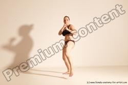 Underwear Martial art Woman White Moving poses Average long colored Dynamic poses Academic