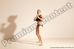 Underwear Martial art Woman White Moving poses Average long colored Dynamic poses Academic