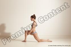 Swimsuit Gymnastic poses Woman White Moving poses Slim long brown Dynamic poses Academic