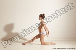 Swimsuit Gymnastic poses Woman White Moving poses Slim long brown Dynamic poses Academic