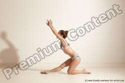 Swimsuit Gymnastic poses Woman White Moving poses Slim long brown Dynamic poses Academic