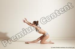 Swimsuit Gymnastic poses Woman White Moving poses Slim long brown Dynamic poses Academic