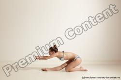 Swimsuit Gymnastic poses Woman White Moving poses Slim long brown Dynamic poses Academic