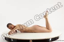 Nude Woman White Laying poses - ALL Slim Laying poses - on stomach bald Multi angle poses Pinup