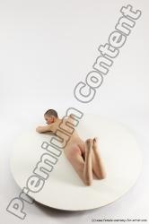 Nude Woman White Laying poses - ALL Slim Laying poses - on stomach bald Multi angle poses Pinup