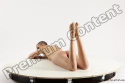 Nude Woman White Laying poses - ALL Slim Laying poses - on stomach bald Multi angle poses Pinup