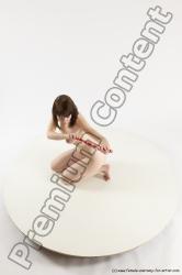 Nude Woman White Sitting poses - ALL Slim medium brown Sitting poses - on knees Multi angle poses Pinup