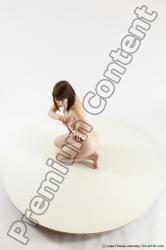 Nude Woman White Sitting poses - ALL Slim medium brown Sitting poses - on knees Multi angle poses Pinup