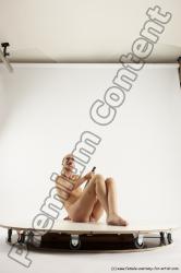 Nude Fighting with knife Woman White Slim bald Multi angle poses Pinup