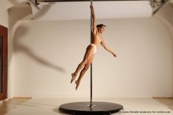 Poledance reference poses of Mercedes