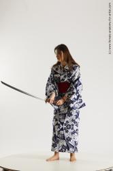 Casual Fighting with sword Woman Asian Sitting poses - ALL Slim medium black Sitting poses - simple Standard Photoshoot Academic