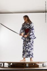 Casual Fighting with sword Woman Asian Sitting poses - ALL Slim medium black Sitting poses - simple Standard Photoshoot Academic